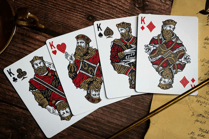 Devil's in the Details - Rose Gold in Leather Pouch Playing Cards by Riffle Shuffle Playing Card Company