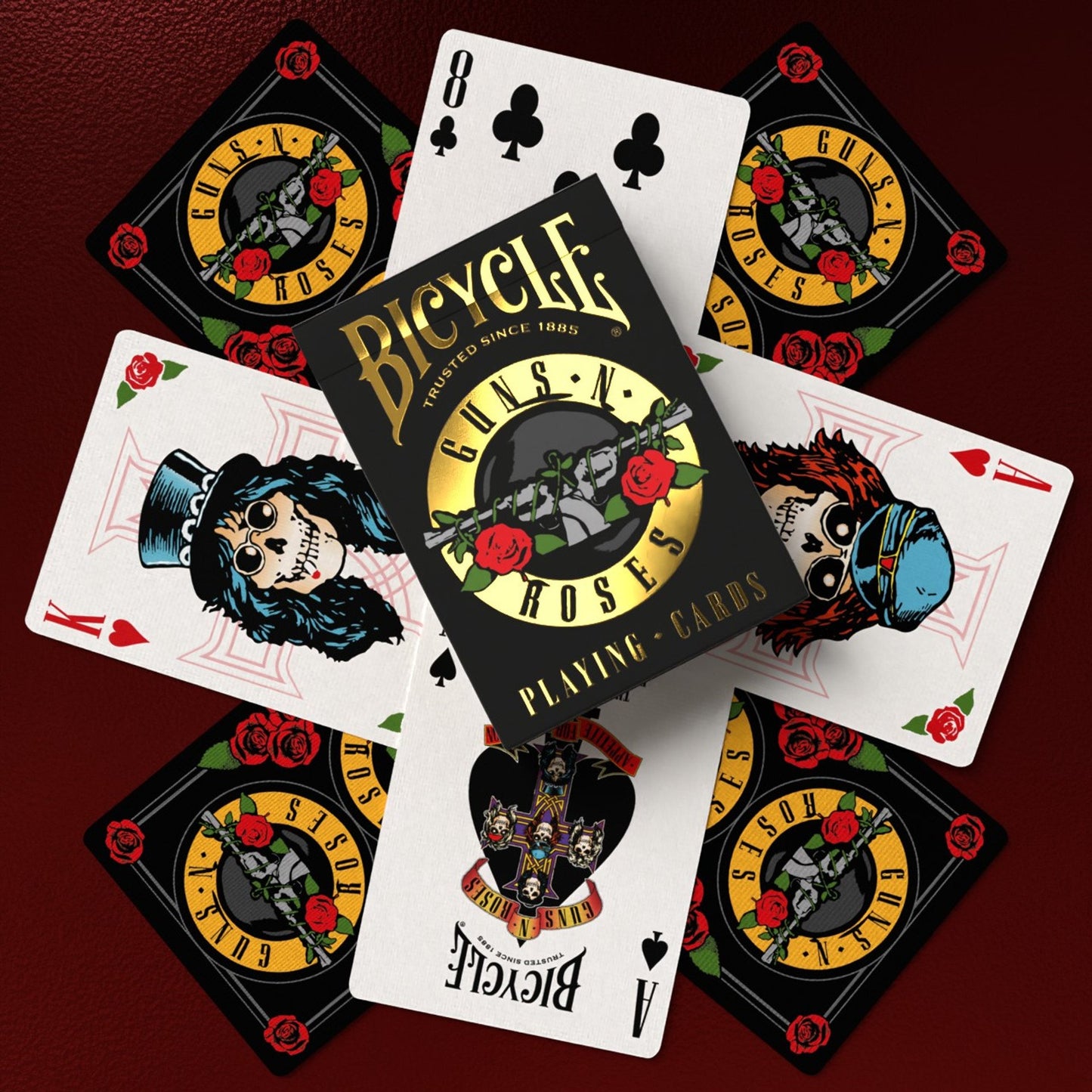Bicycle Guns N' Roses playing cards on a dark red background