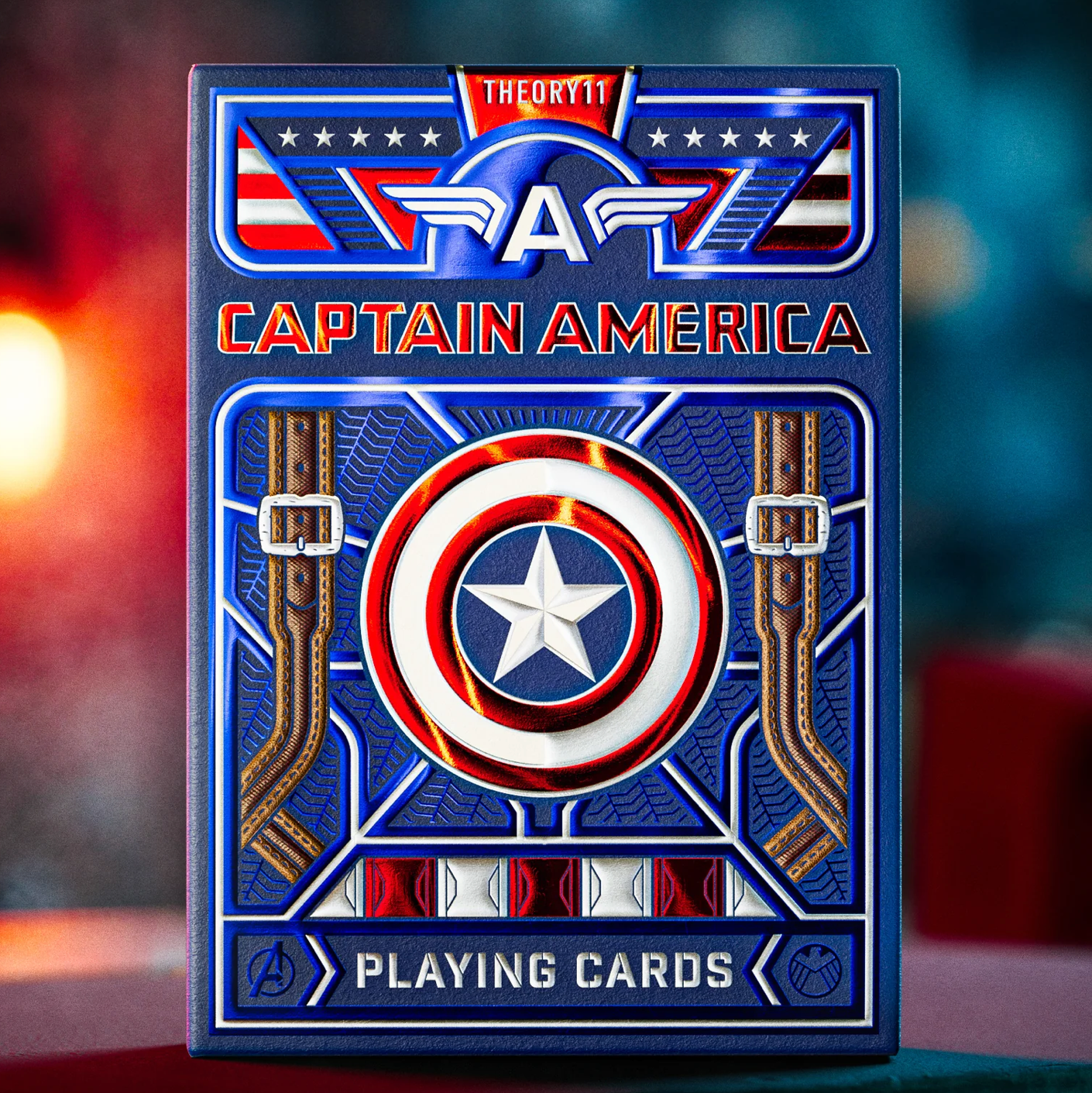Captain America playing cards with American flag design on a blurred background