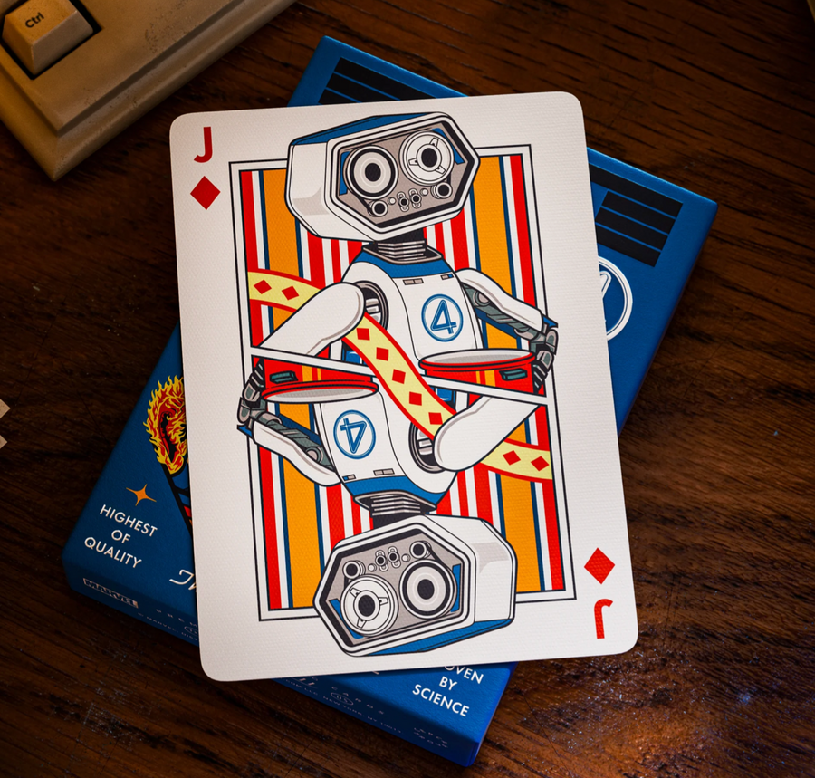 Playing card with robot design on a wooden surface