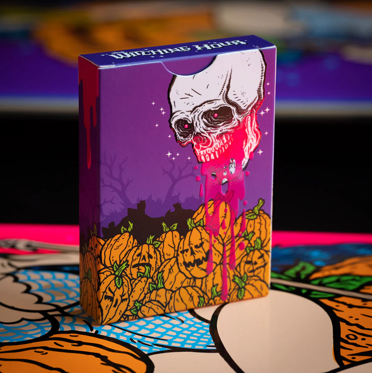 Fultons Witching Hour Playing Cards Card game box with a skull and pumpkins design on a colorful background