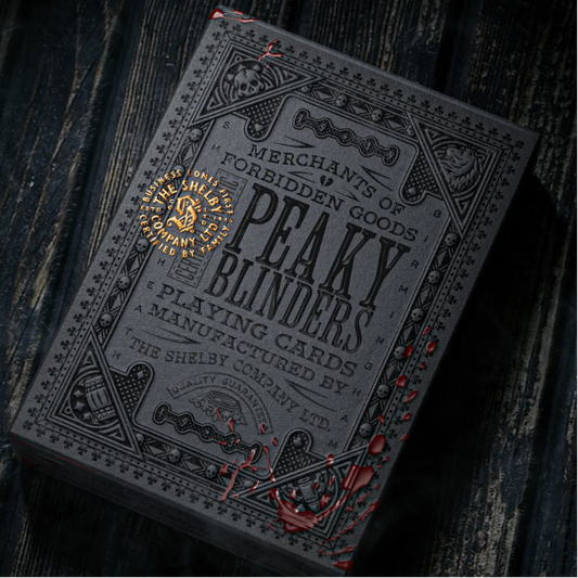 Peaky Blinders playing cards on a dark textured background