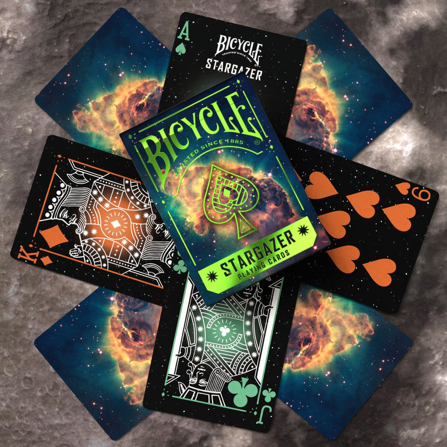 Bicycle Stargazer playing cards on a textured surface