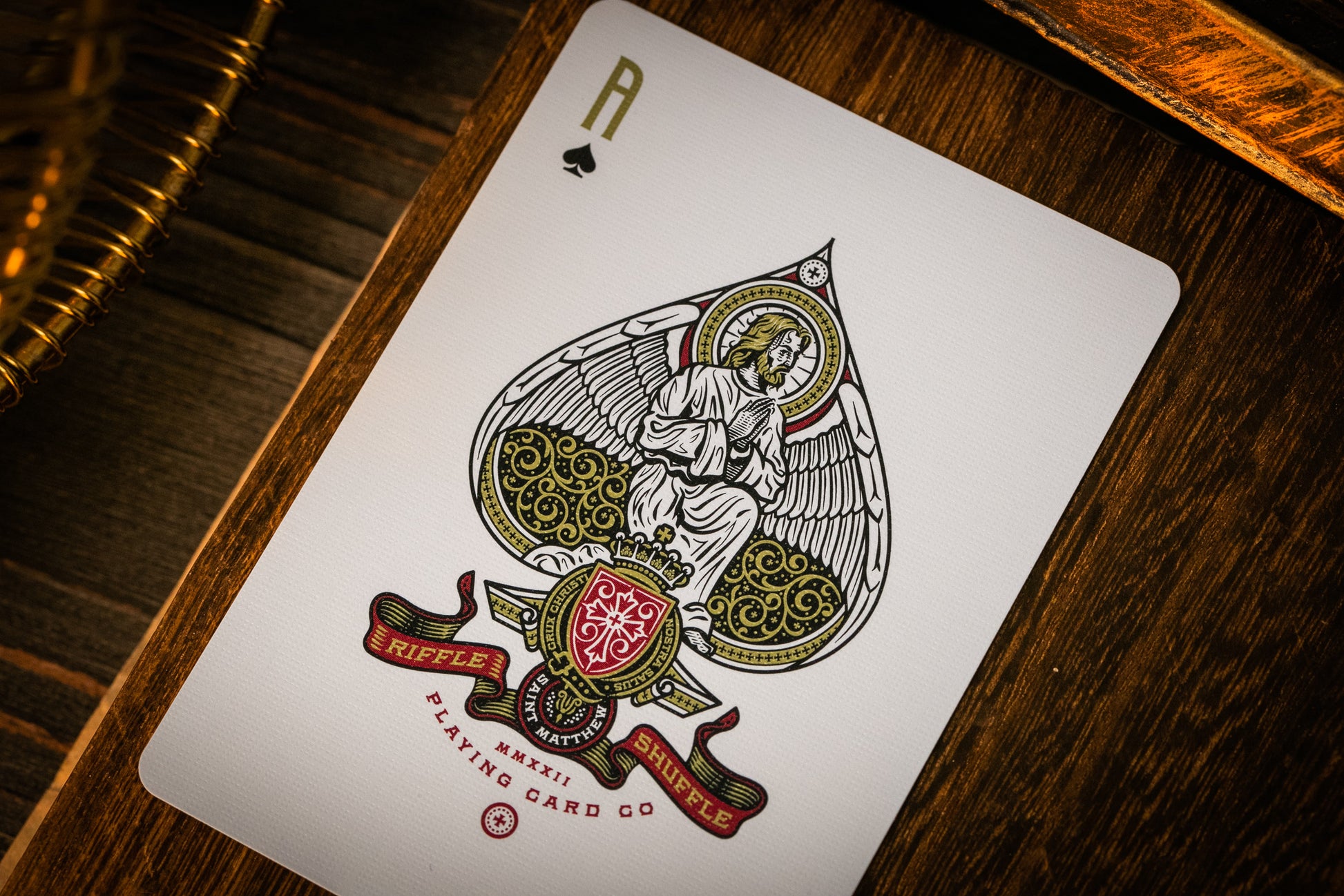 The Cross Playing Cards - Maroon Martyrs Edition Playing Cards by Riffle Shuffle Playing Card Company