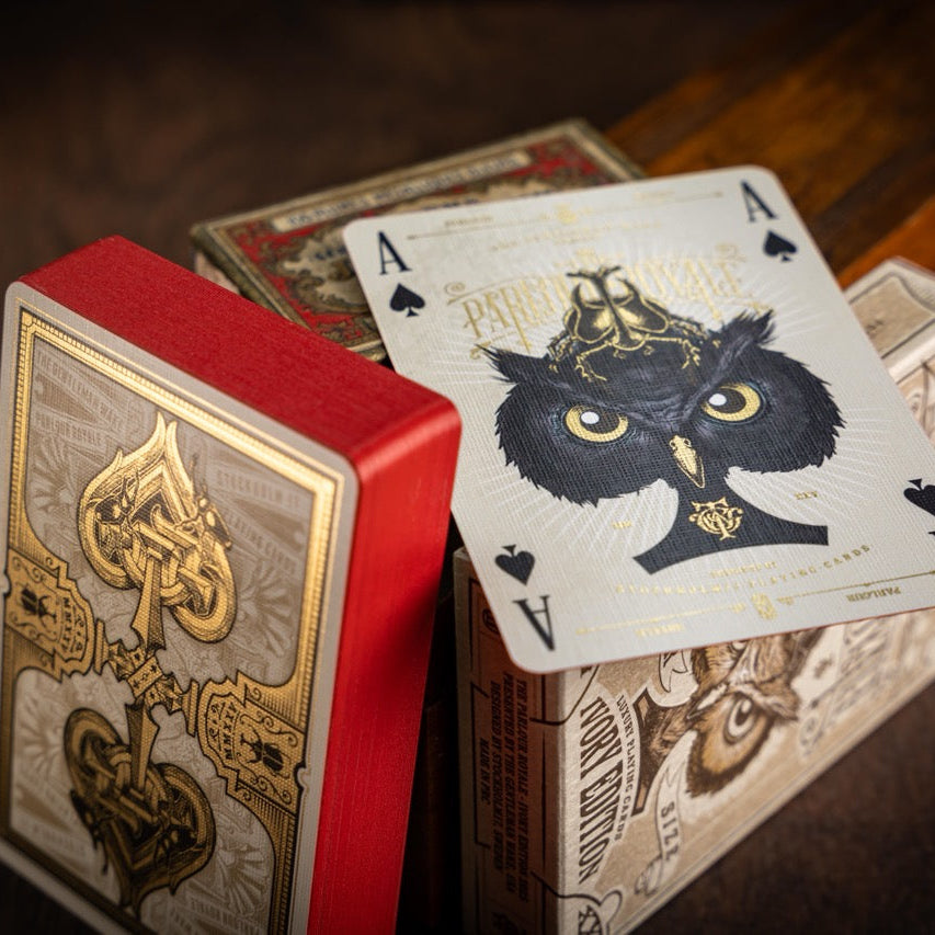 Parlour Playing cards with a distinctive design on a wooden surface