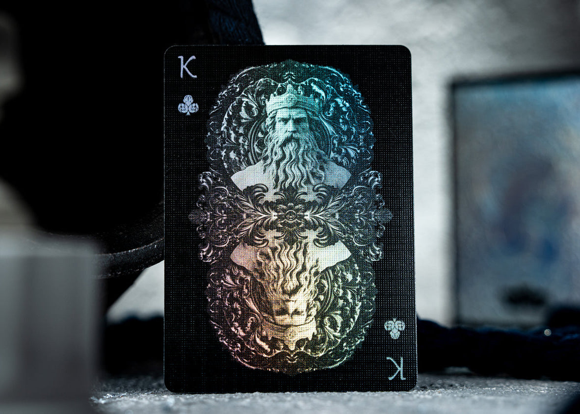 Playing card with a king and tiger design on a blurred background