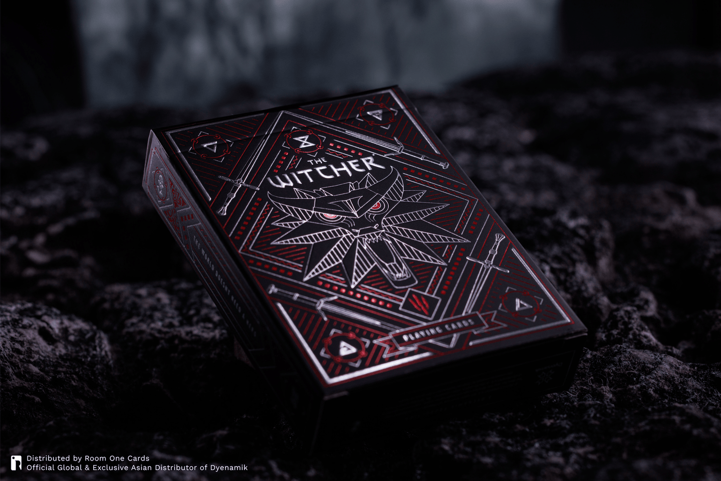 A boxed deck of cards labeled The Witcher