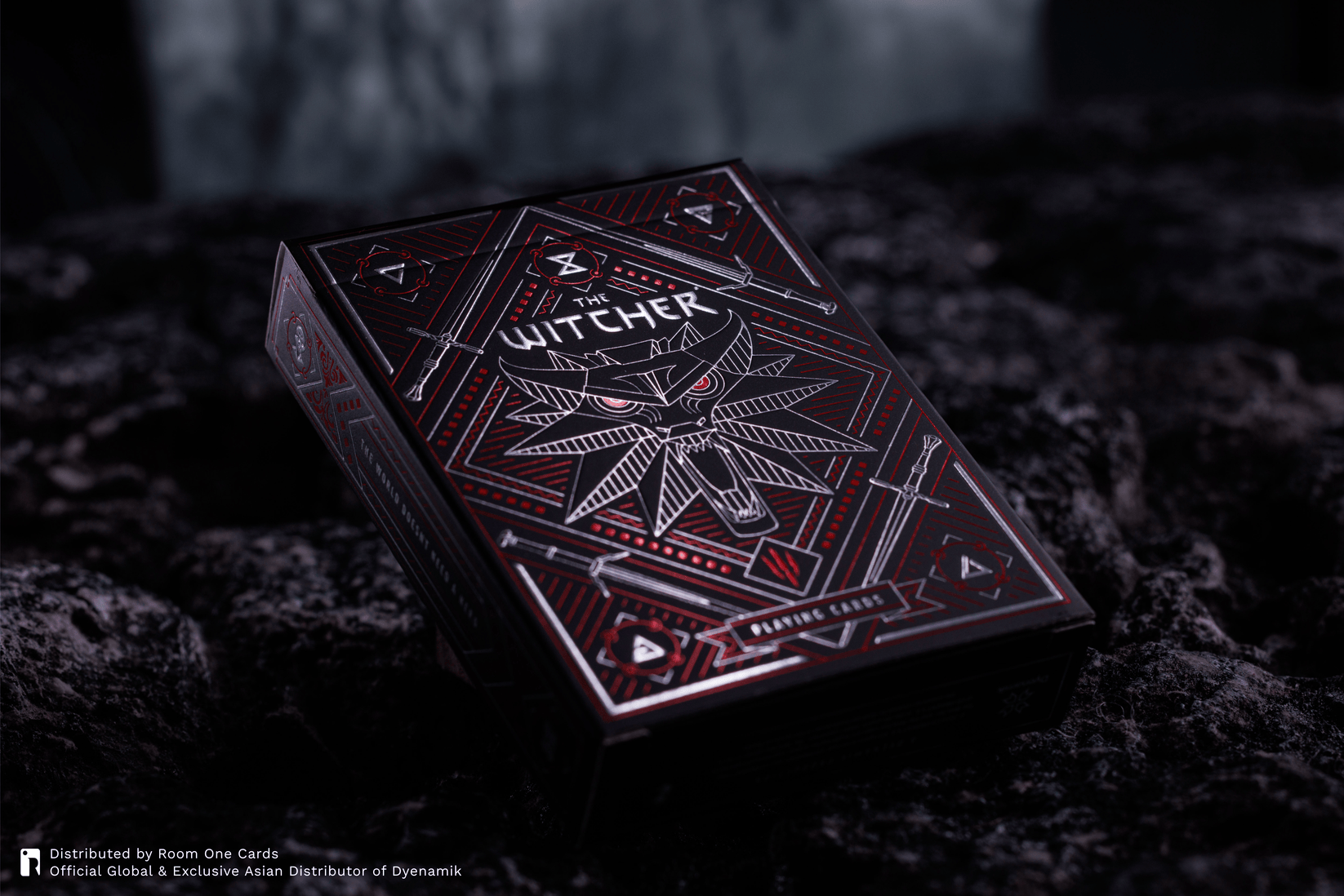 A boxed deck of cards labeled The Witcher