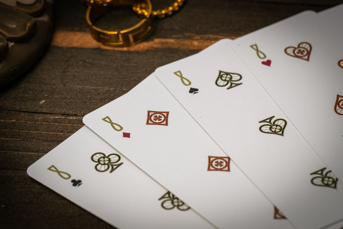 The Cross Playing Cards - Maroon Martyrs Edition Playing Cards by Riffle Shuffle Playing Card Company