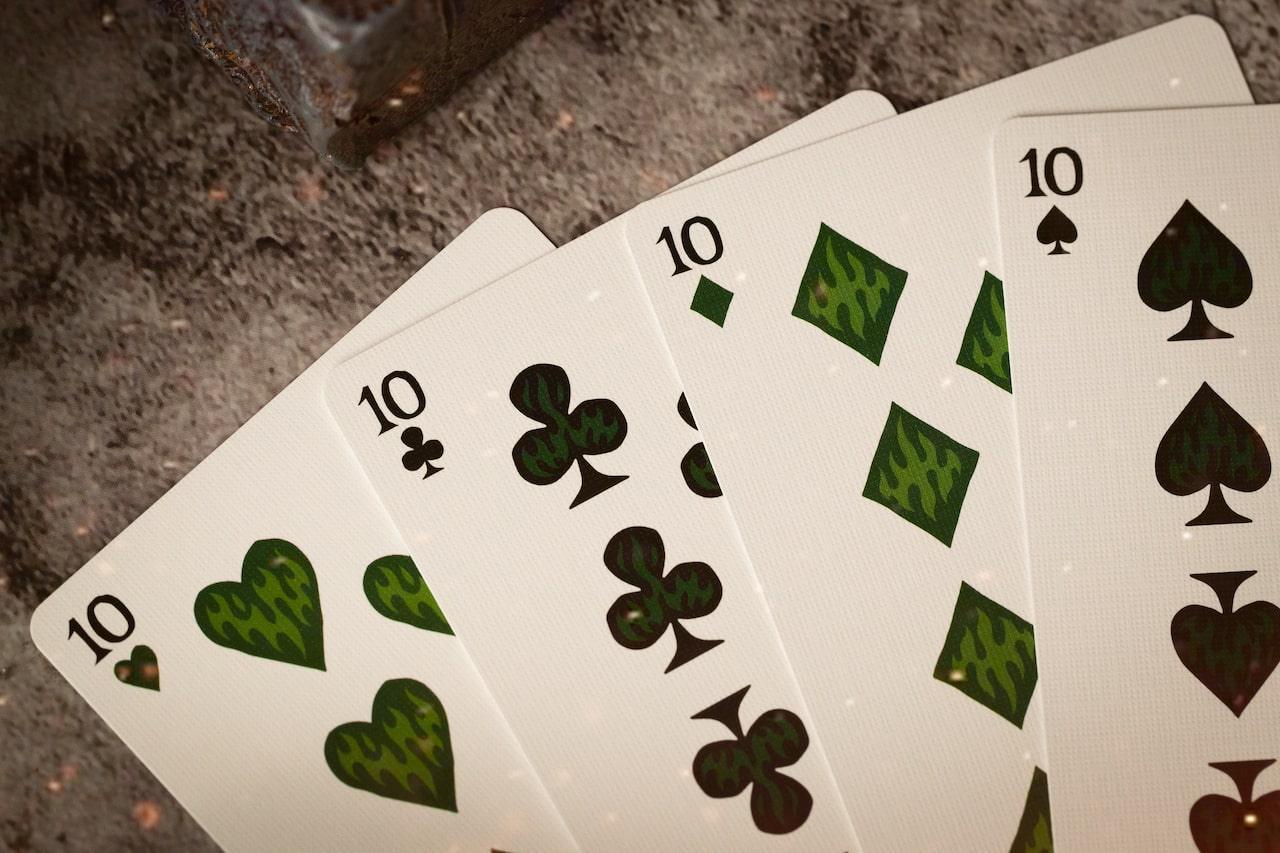 Sacred Fire Playing Cards - Emerald Flare Edition Playing Cards by Riffle Shuffle Playing Card Company