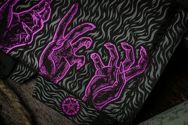 666 Purple Inferno Playing Cards by Riffle Shuffle Playing Cards by RarePlayingCards.com